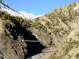 03 The Trail To Khangsar Crosses The Bridge Over The Jharsang Khola With La Grande Barrier Ahead After Leaving Manang On Trek To Tilicho Tal Lake